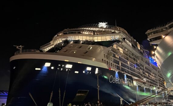 Celebrity Apex Cruise Ship lit up at night