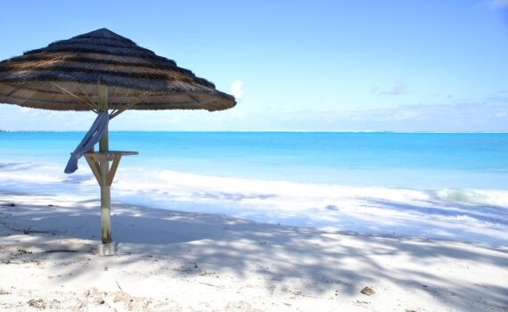 Beach with umbrella on Turks Island (Turks & Caicos)