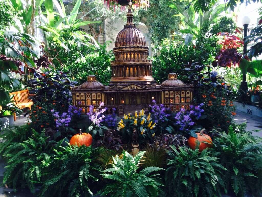 Fall display of a miniature bronzed US Capitol building at the US Botanic Garden in DC