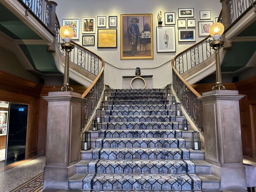 wide staircase in the lobby of the Dixon Tower Bridge Hotel in London