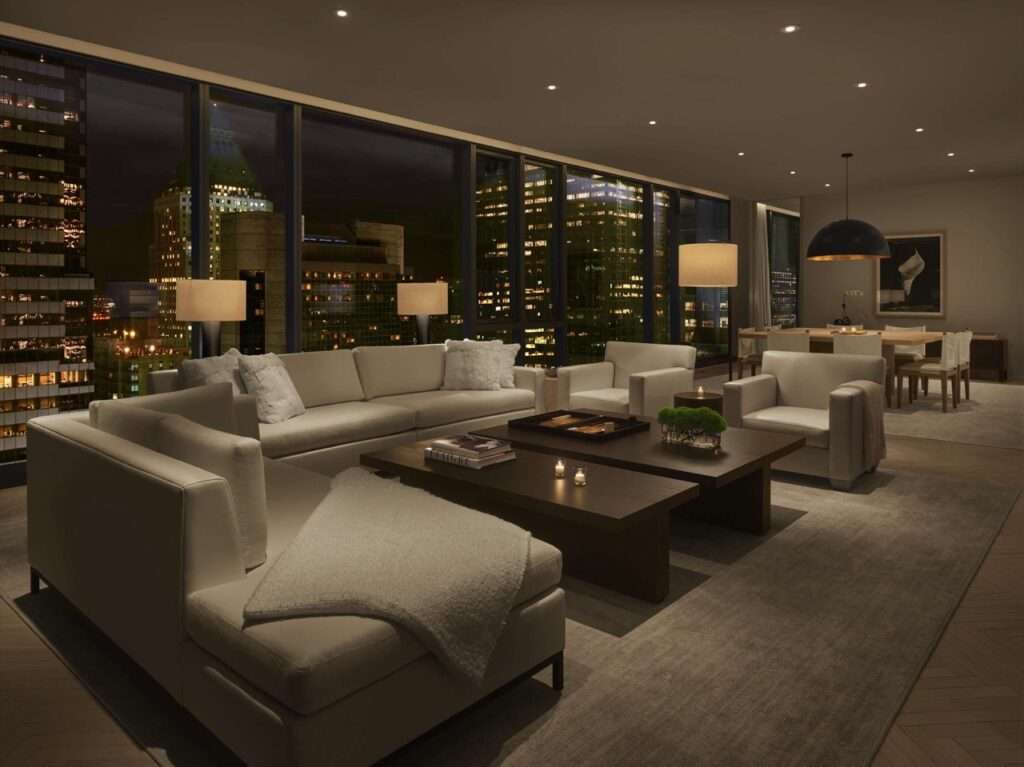Edition Times Square - Penthouse NYC - Sitting area with large windows - views of New York
