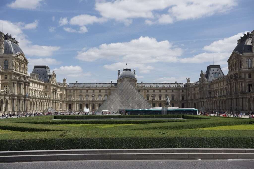 Louvre Museum in Paris, with the glass pyramid in front