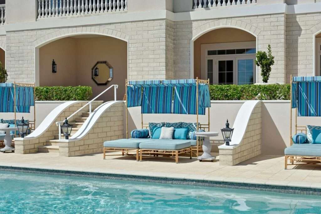 Poolside at the Rosewood in Bermuda. Lounge chairs and cabanas