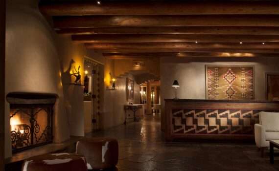 Lobby at the Rosewood Inn in Santa Fe. Decorated with a Spanish style.