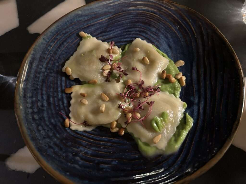 Sweet potato ravioli in a broccoli pesto