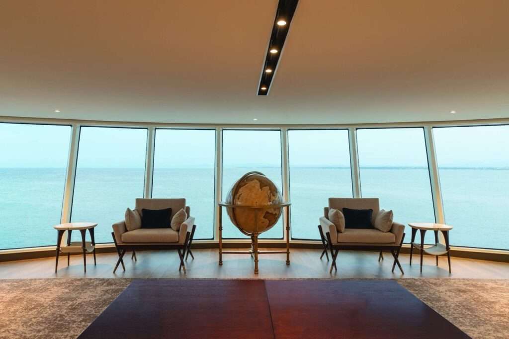 Lounge with a view of the ocean from the Silversea cruise ship the Origin - a small luxury cruise ship