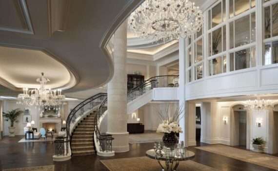Lobby at the St Regis in Atlanta. Large circular staircase and beautiful chandelier.