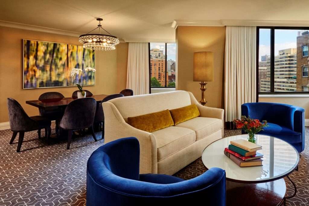 A suite room, with living and dining area at the Rittenhouse Suite at the Rittenhouse Hotel in Philadelphia
