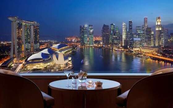 View from a room at the Ritz-Carlton Singapore - overlooking the marina and city sky line lit up a night