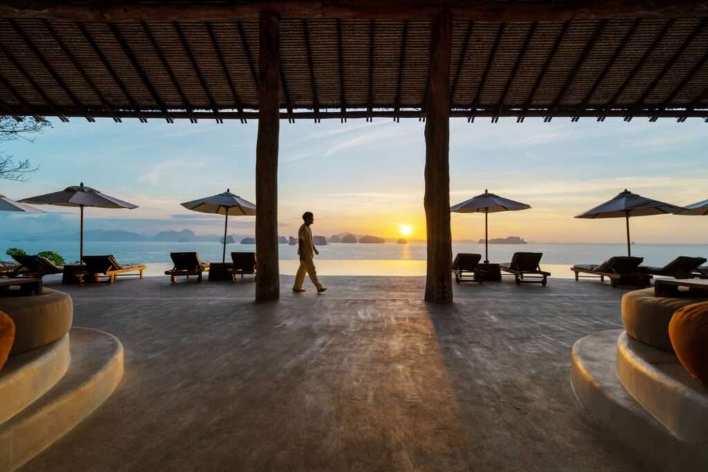 View from the Hilltop Restaurant and Bar at Six Senses Yao Noi - sun is setting over the water