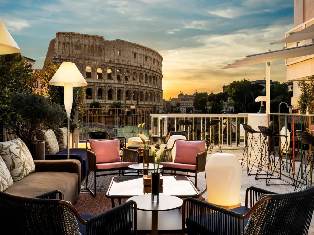 Court Lounge Bar at Palazzo Manfredi - outdoors with a view of the Coliseum - a luxury hotel in Rome 