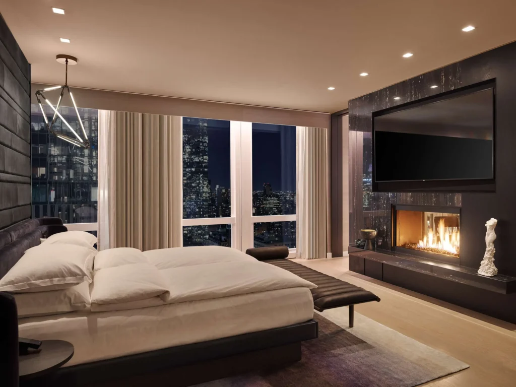 Equinox Suite Bedroom with Fireplace - a luxury hotel in NYC with two bedroom suites