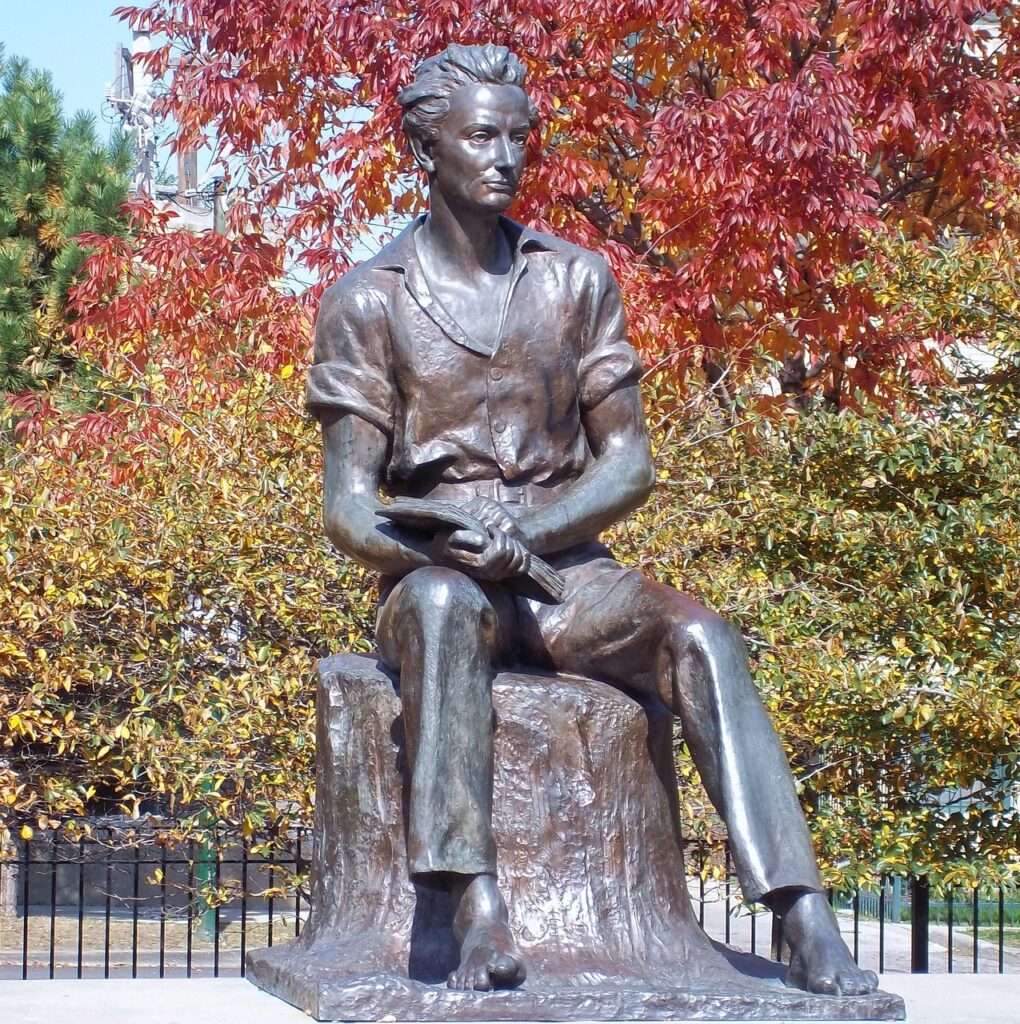 A young Abraham Lincoln in front of Fall Foliage in Chicago Illinois